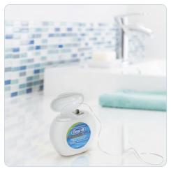 Зубная нить Oral-B Essential floss Waxed мятная 50 м Фото 5