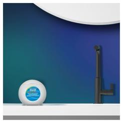 Зубная нить Oral-B Essential floss Waxed мятная 50 м Фото 7